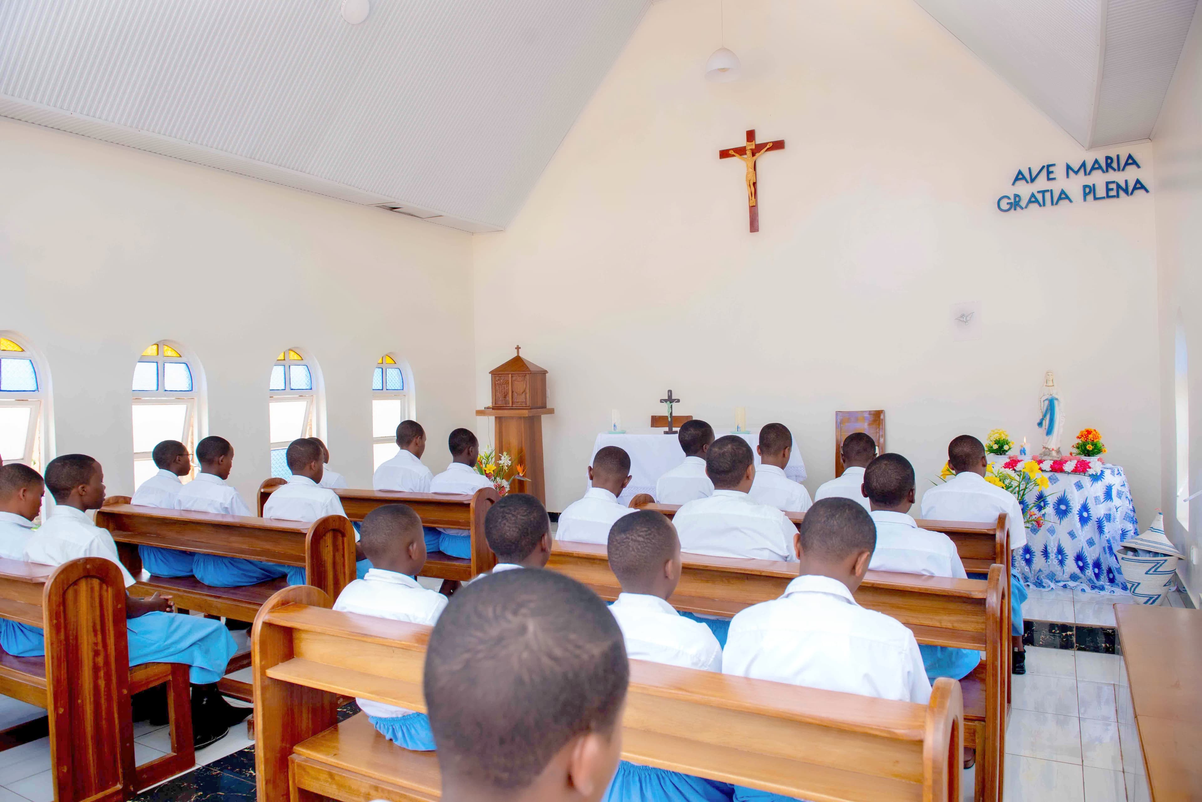 Students in chapel or gathered in uniform for morning devotion or Mass.
