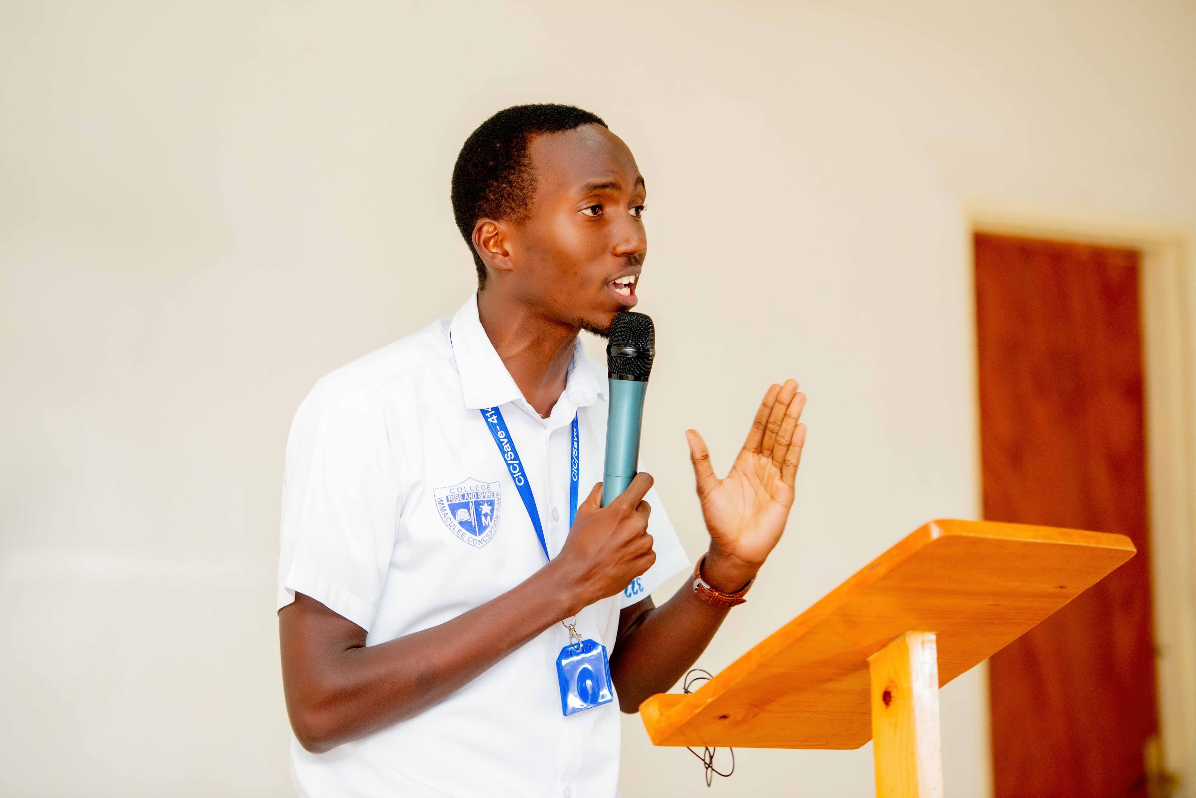Student leaders addressing a crowd or participating in a debate competition.